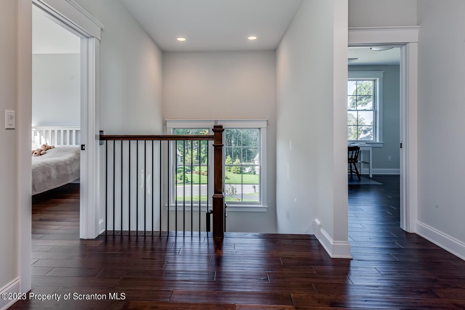115 Rock Ridge Drive Clarks Summit, PA 18411 - Photo 23 of 43 a view of hallway with wooden floor