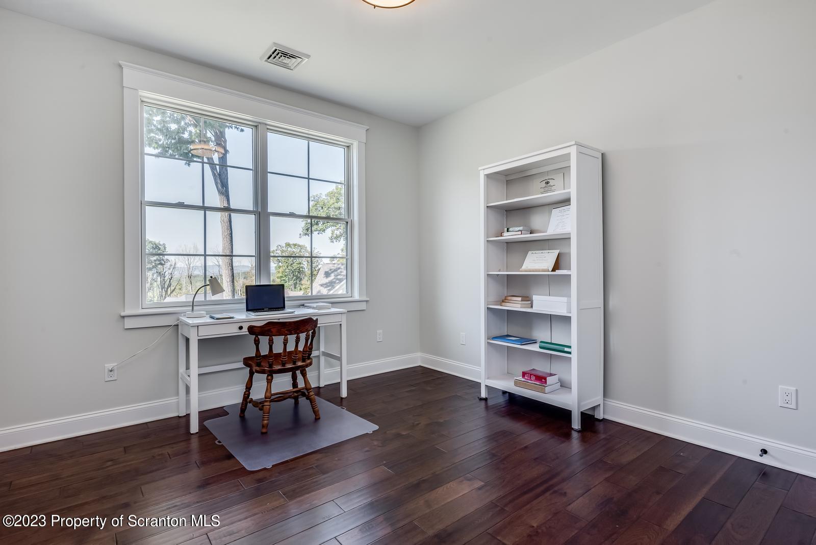 115 Rock Ridge Drive Clarks Summit, PA 18411 - Photo 25 of 43 a workspace with furniture hardwood and a window