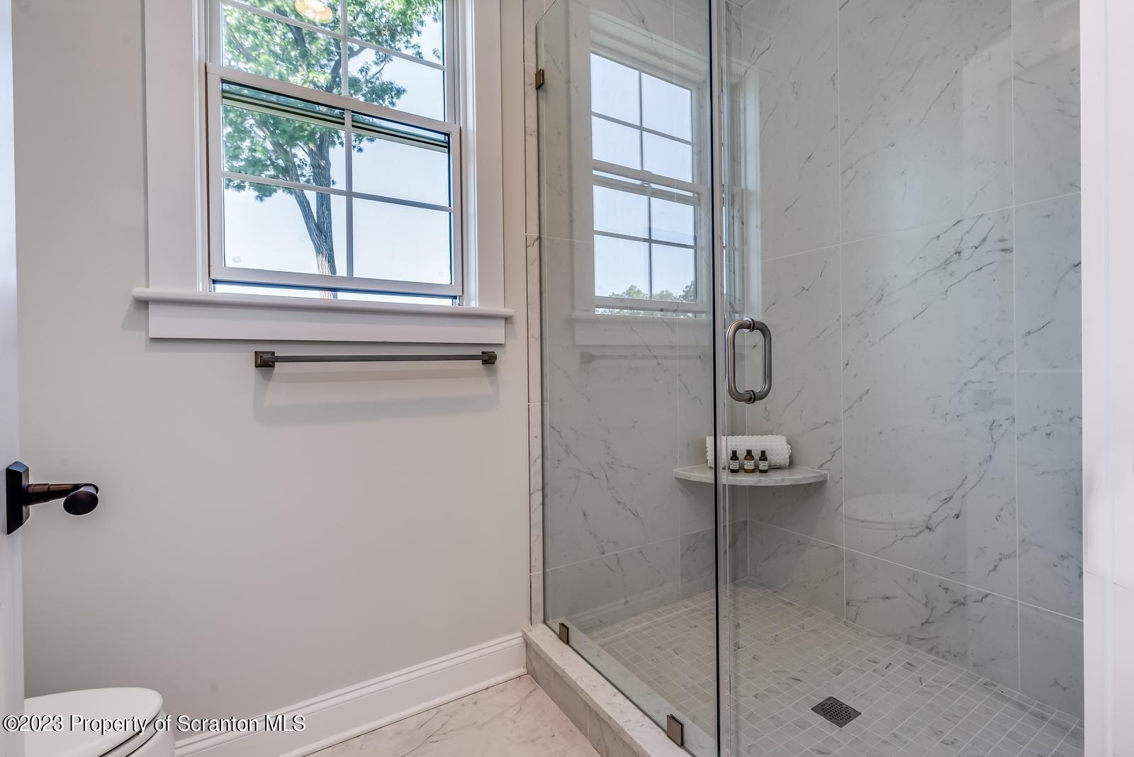 115 Rock Ridge Drive Clarks Summit, PA 18411 - Photo 29 of 43 a bathroom with a shower