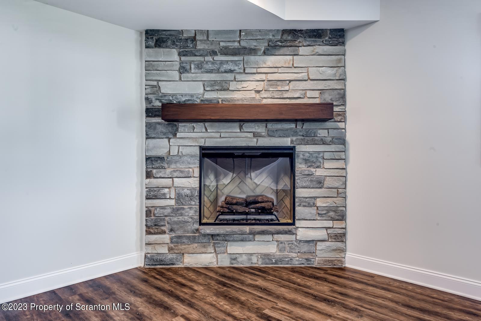115 Rock Ridge Drive Clarks Summit, PA 18411 - Photo 33 of 43 a room with fireplace