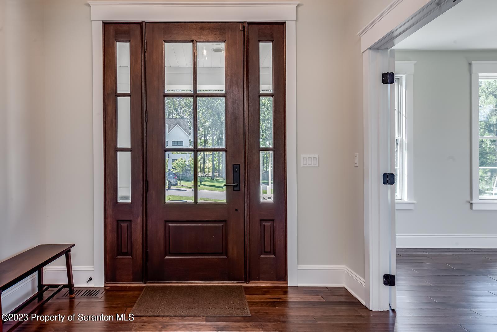 115 Rock Ridge Drive Clarks Summit, PA 18411 - Photo 4 of 43 a view of front door with wooden floor