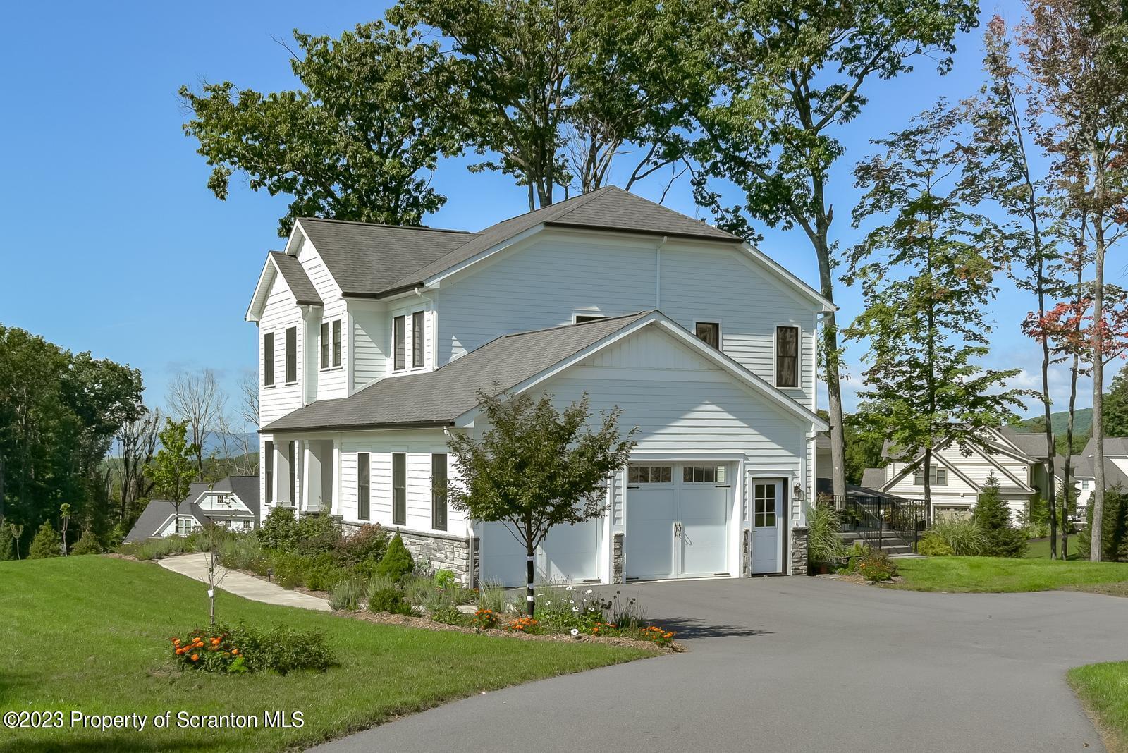 115 Rock Ridge Drive Clarks Summit, PA 18411 - Photo 42 of 43 front view of a house with a yard