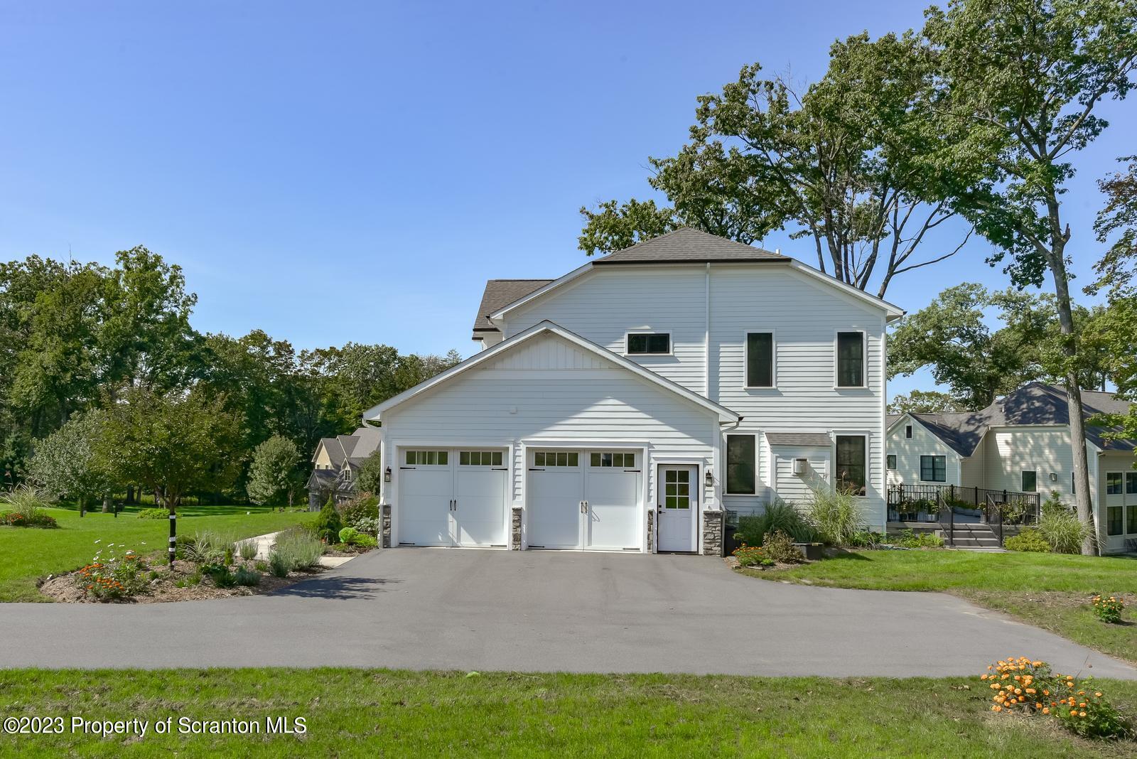 115 Rock Ridge Drive Clarks Summit, PA 18411 - Photo 43 of 43 a front view of a house with a yard