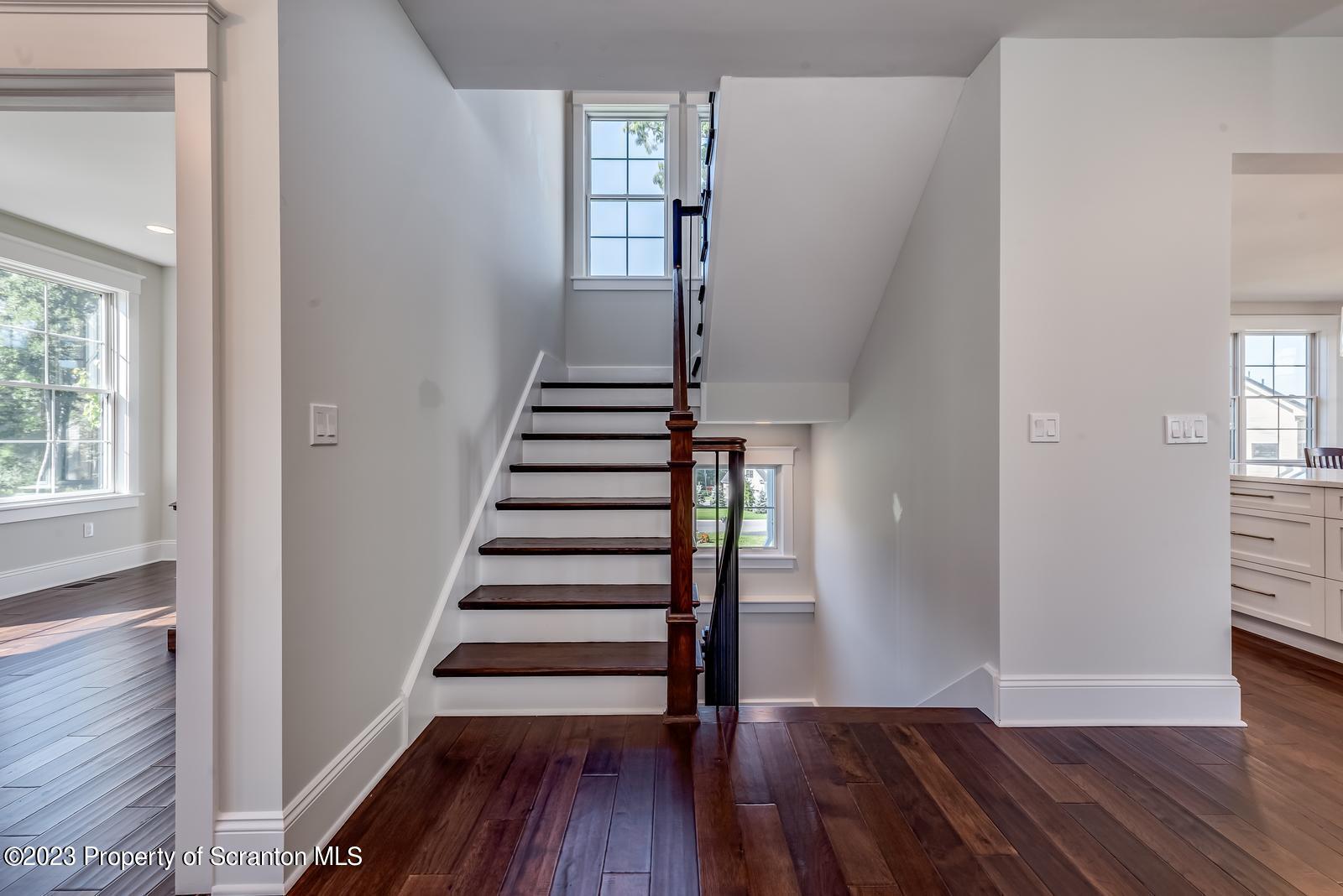 115 Rock Ridge Drive Clarks Summit, PA 18411 - Photo 9 of 43 a view of entryway with wooden floor and stairs