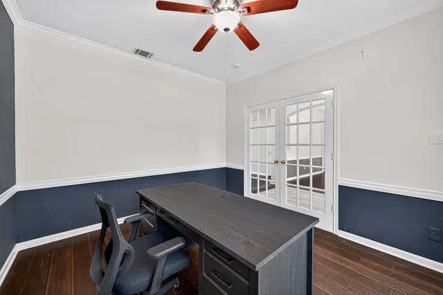 a view of a workspace with furniture