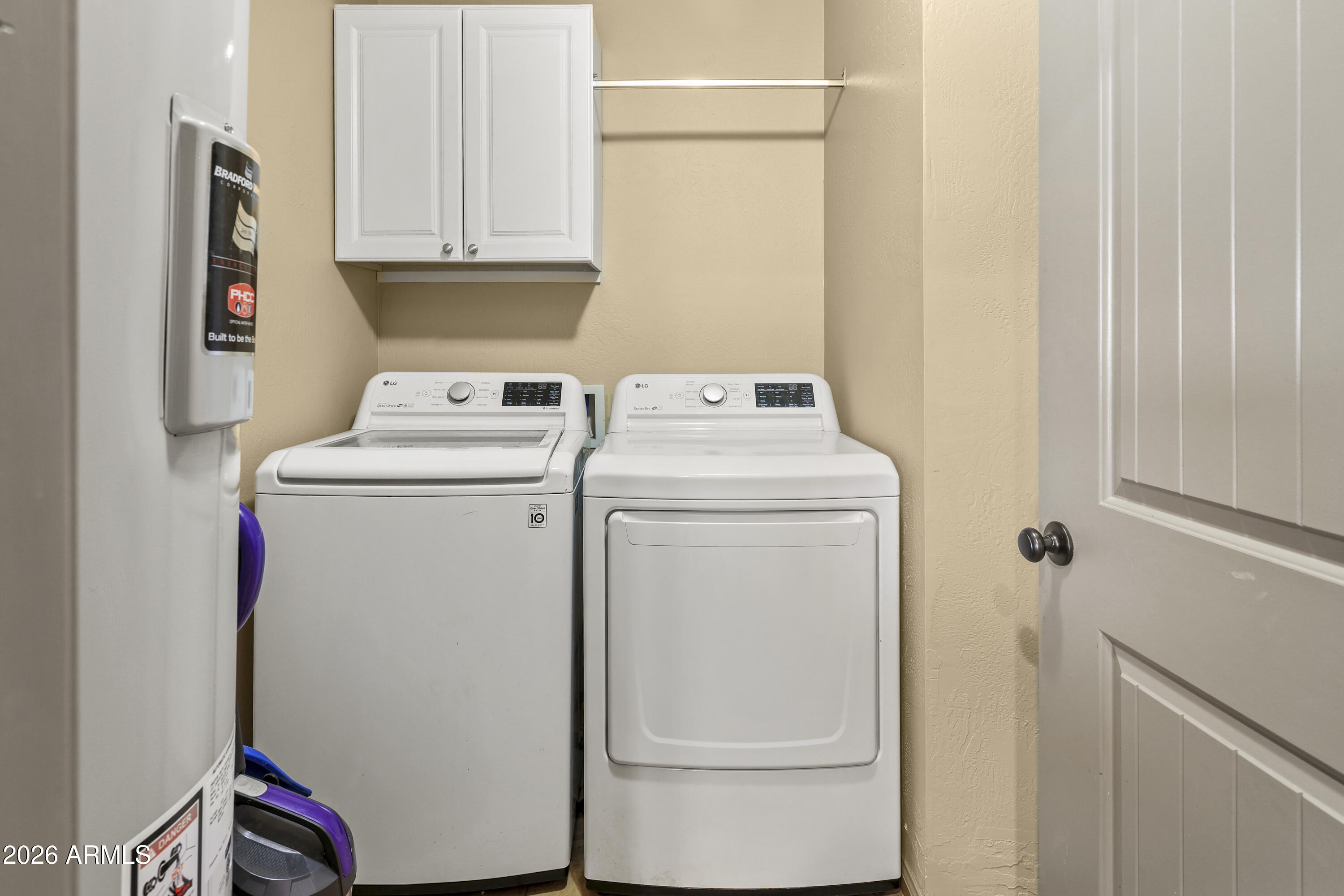 1890 West Roderick Lane Wickenburg, AZ 85390 - Photo 18 of 41 a utility room with dryer and washer