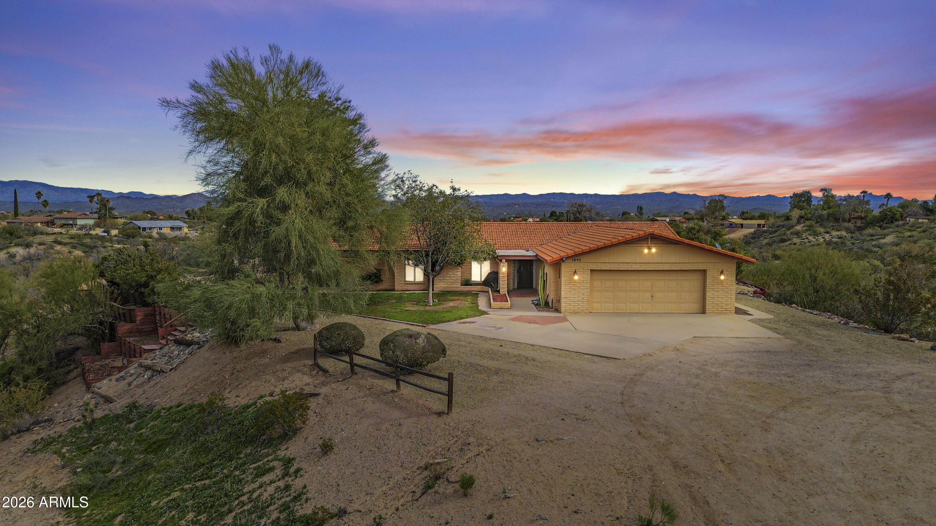 1890 West Roderick Lane Wickenburg, AZ 85390 - Photo 37 of 41 a view of a house with a yard