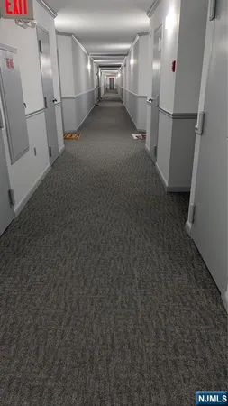 a view of a hallway with staircase