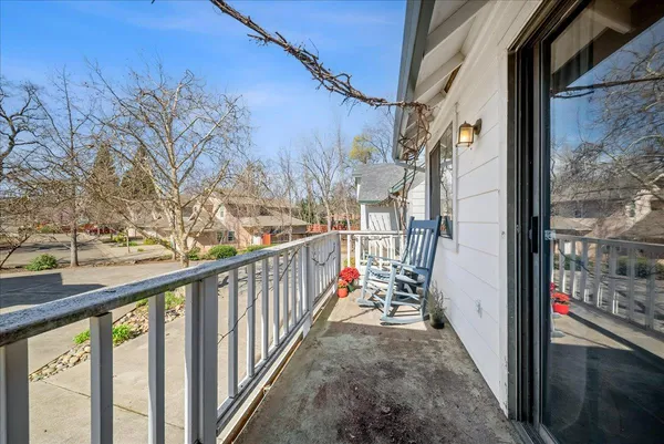 a view of outdoor space with deck and furniture