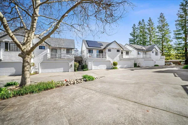 a view of house with a street