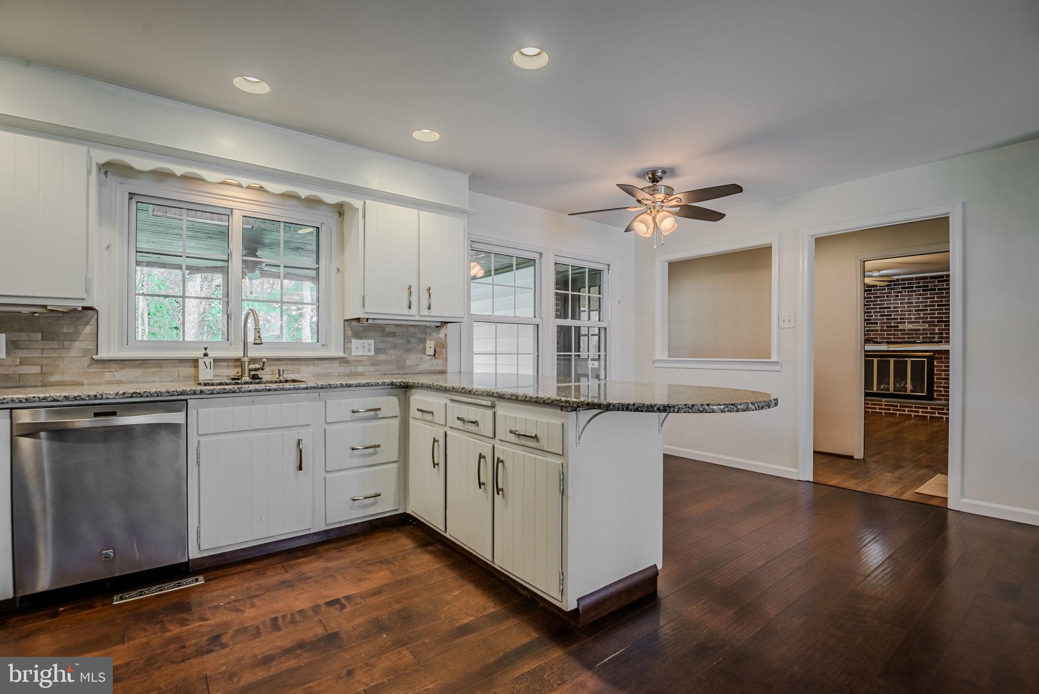 211 Hitching Post Drive Wilmington, DE 19803 - Photo 18 of 67 Kitchen - Looking into Main Floor Family Room