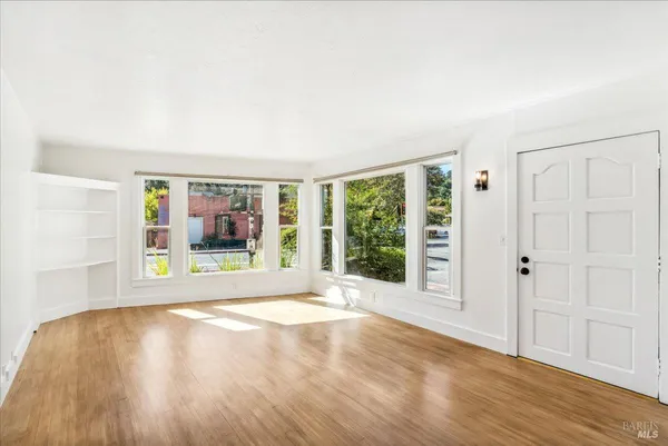 a view of entryway with wooden floor