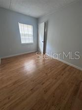 525 South Conway Road, Unit 54 Orlando, FL 32807 - Photo 13 of 16 an empty room with windows