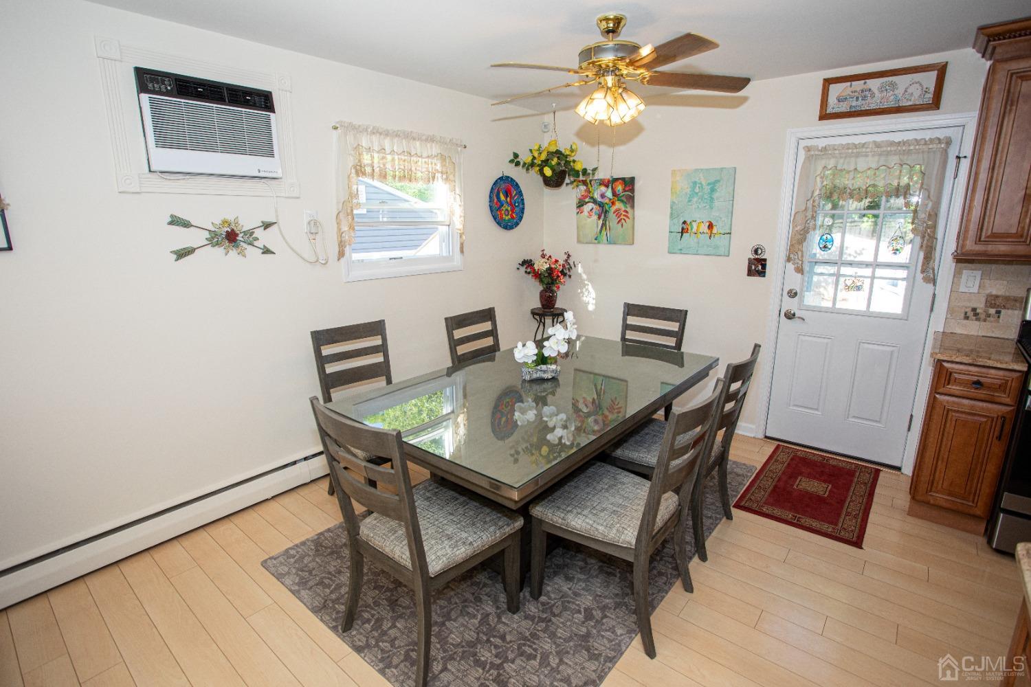 25 Finley Road Edison, NJ 08817 - Photo 21 of 51 a view of a dining room with furniture window and wooden floor