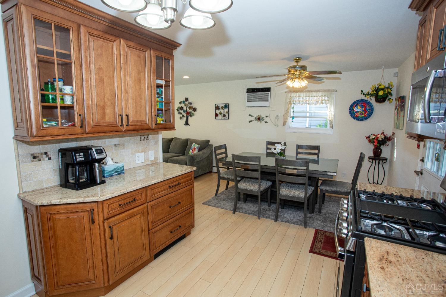 25 Finley Road Edison, NJ 08817 - Photo 23 of 51 a view of a kitchen and dining room