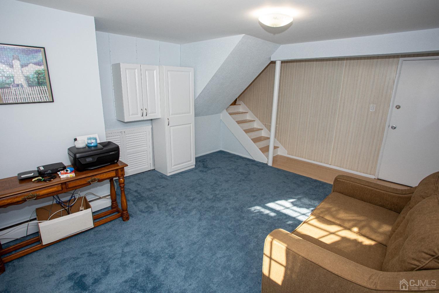 25 Finley Road Edison, NJ 08817 - Photo 39 of 51 a living room with furniture and a window