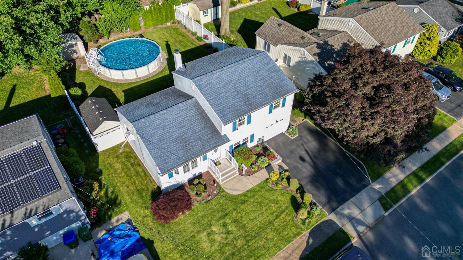 25 Finley Road Edison, NJ 08817 - Photo 45 of 51 an aerial view of a house swimming pool and outdoor space