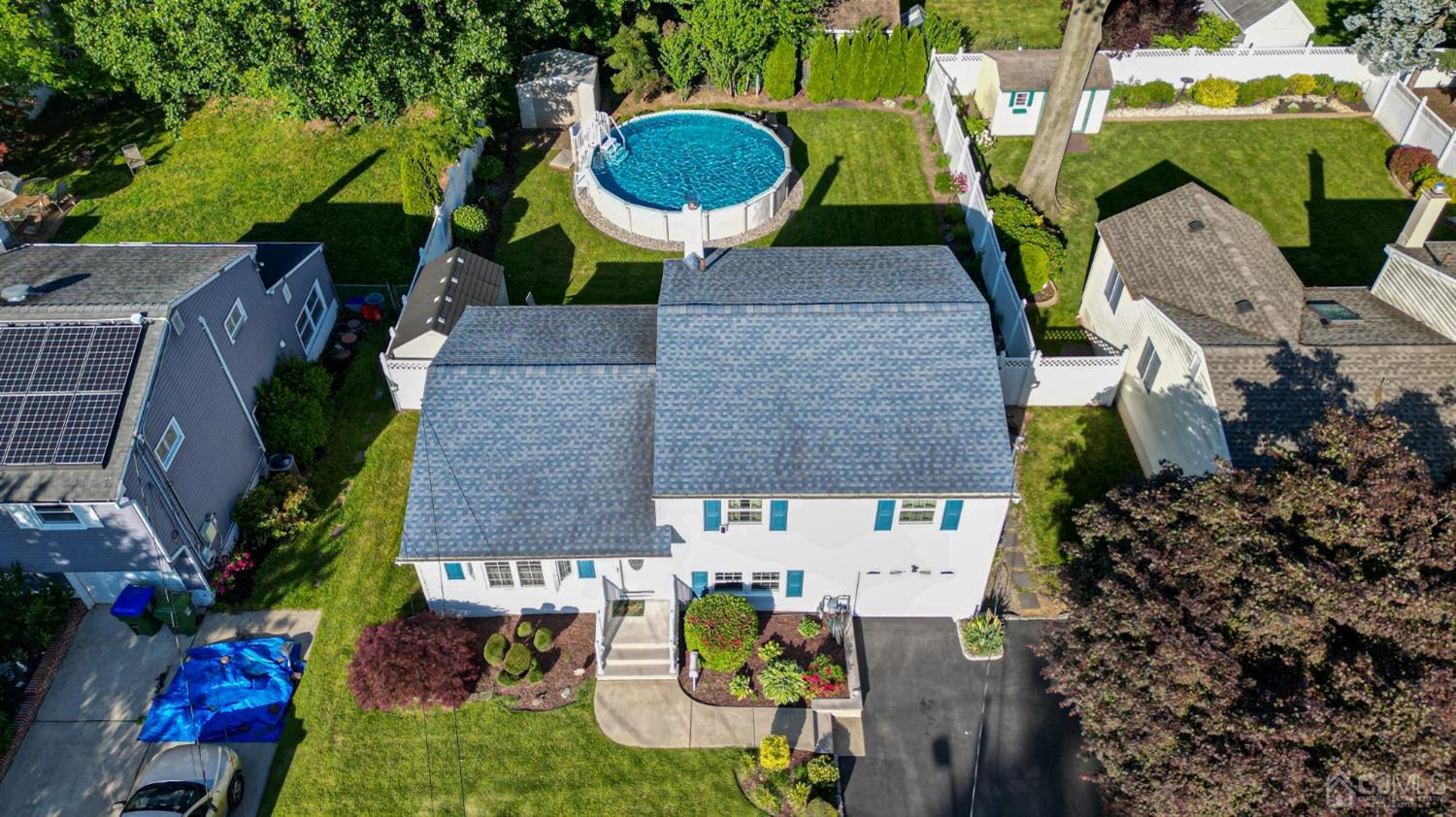 25 Finley Road Edison, NJ 08817 - Photo 46 of 51 an aerial view of a house with outdoor space and tennis court