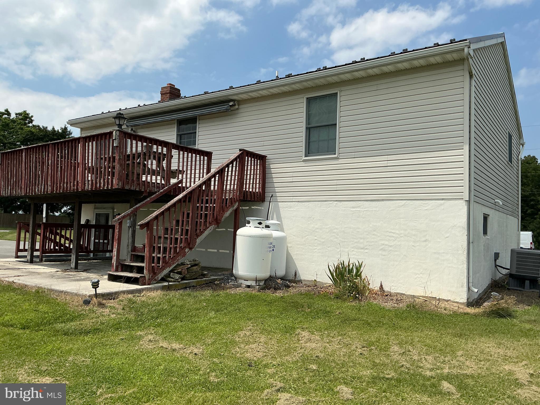 665 Game Lands Road Aspers, PA 17304 - Photo 3 of 40 a view of a house with wooden deck and a garden