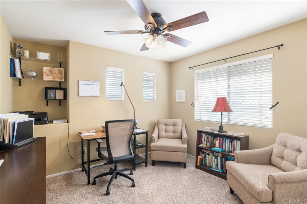 5624 Pheasant Drive Fontana, CA 92336 - Photo 11 of 20 a living room with furniture and a window