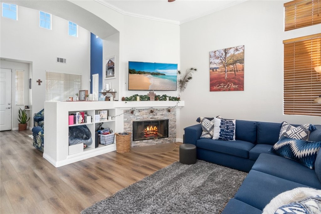 5624 Pheasant Drive Fontana, CA 92336 - Photo 5 of 20 a living room with furniture and a fireplace