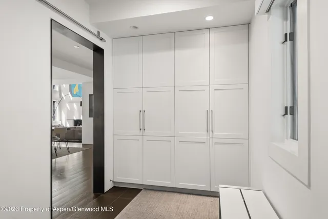 a view of a closet area with entryway