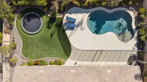 an aerial view of a swimming pool