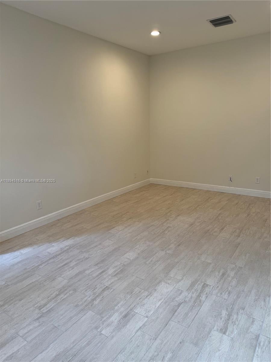 2273 Phoenix Avenue Davie, FL 33324 - Photo 20 of 20 wooden floor in an empty room