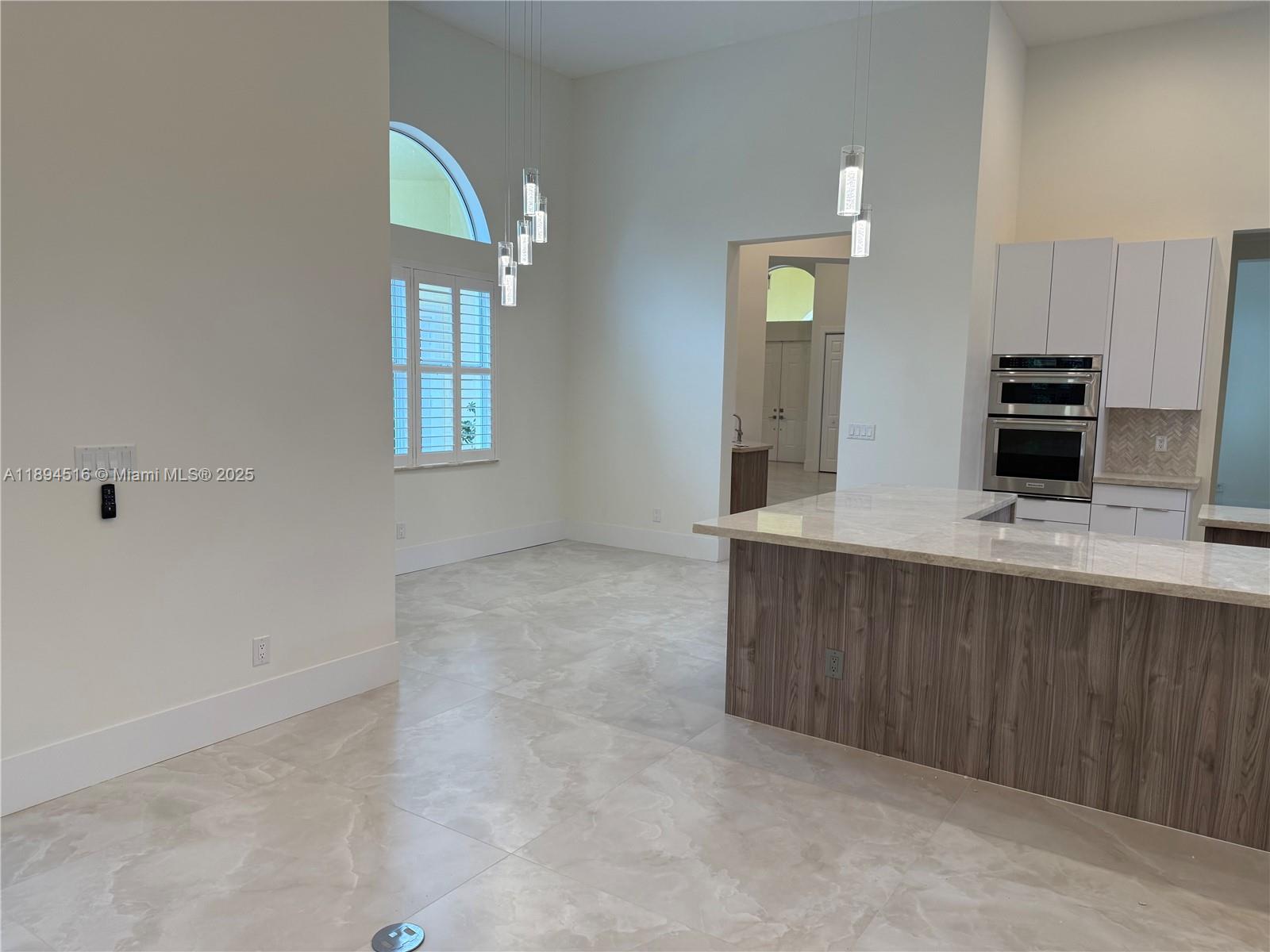 2273 Phoenix Avenue Davie, FL 33324 - Photo 6 of 20 a view with cabinets and window