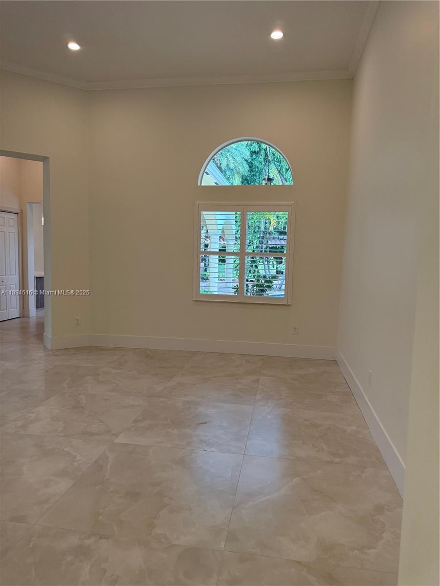 2273 Phoenix Avenue Davie, FL 33324 - Photo 8 of 20 an empty room with windows