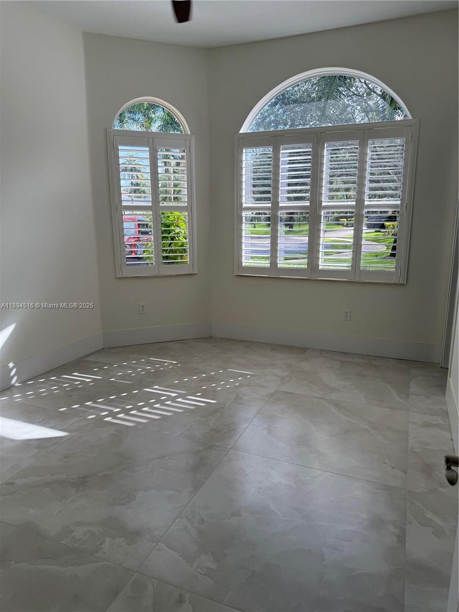 2273 Phoenix Avenue Davie, FL 33324 - Photo 10 of 20 an empty room with windows