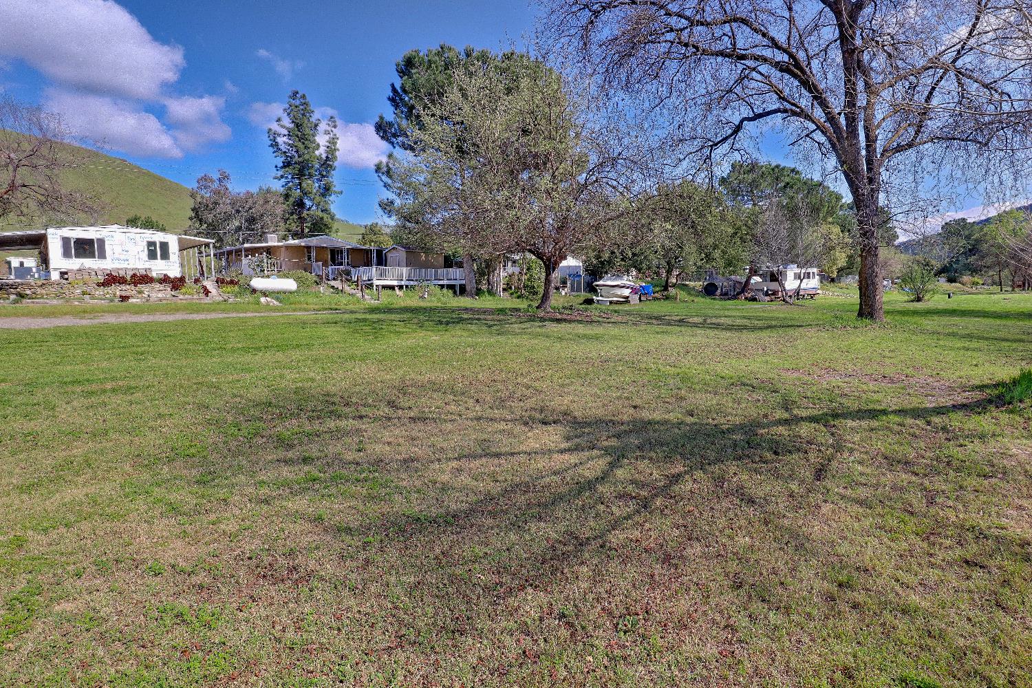 25433 East Trimmer Springs Road, Unit 4 Sanger, CA 93657 - Photo 27 of 33 a view of house with outdoor space and street view