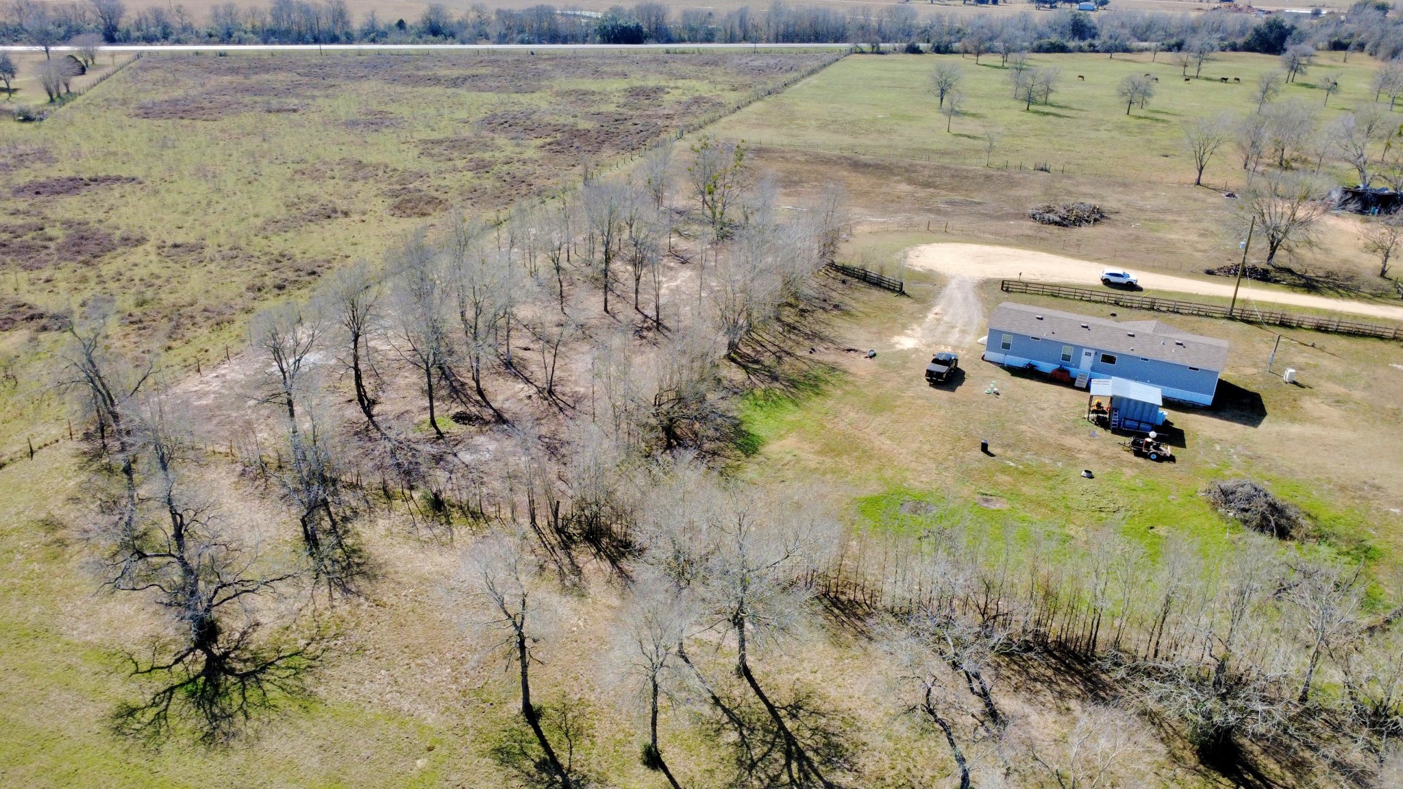 Lot 13 Mesquite Road Wallis, TX 77485 - Photo 8 of 16 a utility room with a yard