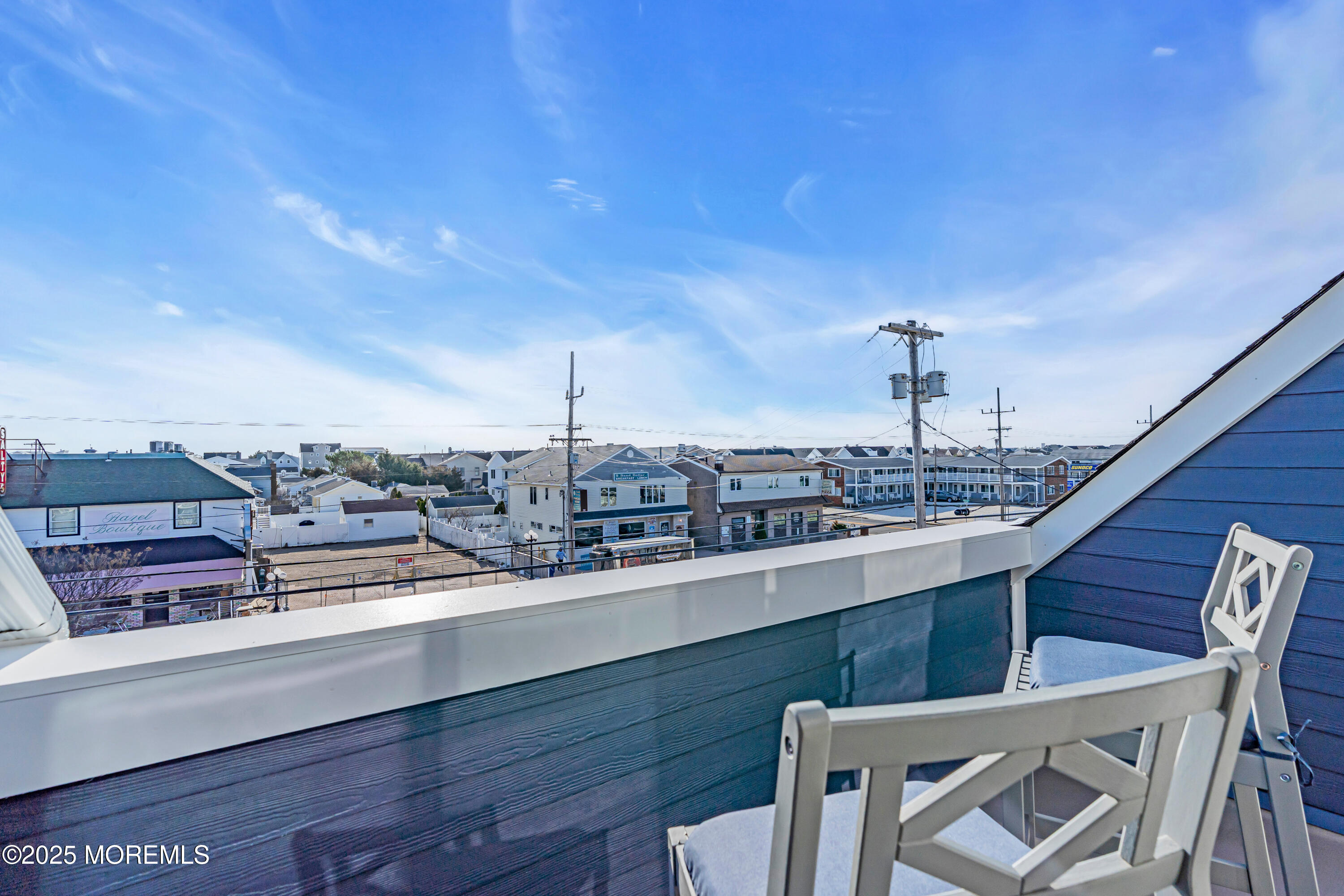 1900 Grand Central Avenue, Unit 3 Lavallette, NJ 08735 - Photo 11 of 21 a view of a balcony with furniture