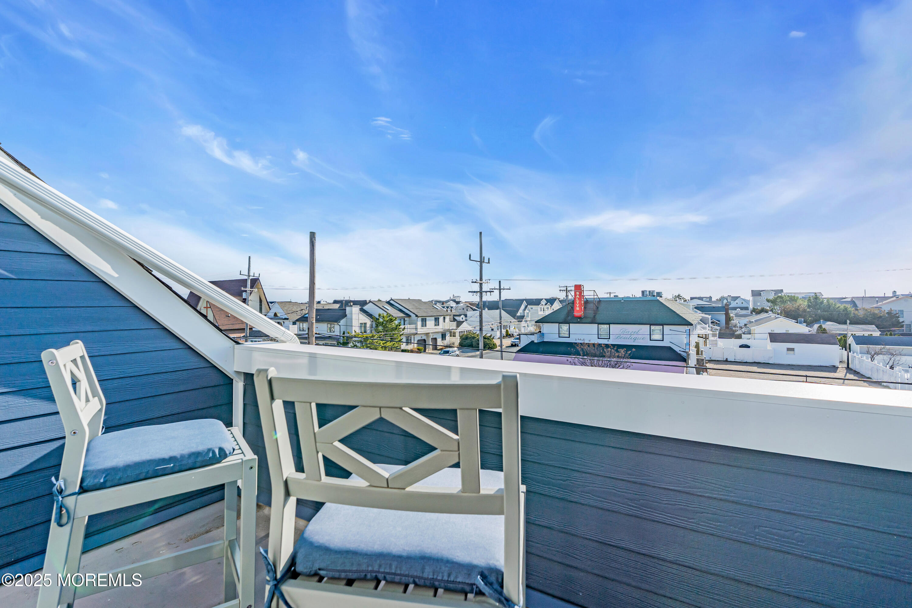 1900 Grand Central Avenue, Unit 3 Lavallette, NJ 08735 - Photo 12 of 21 a view of a chairs and table in a patio
