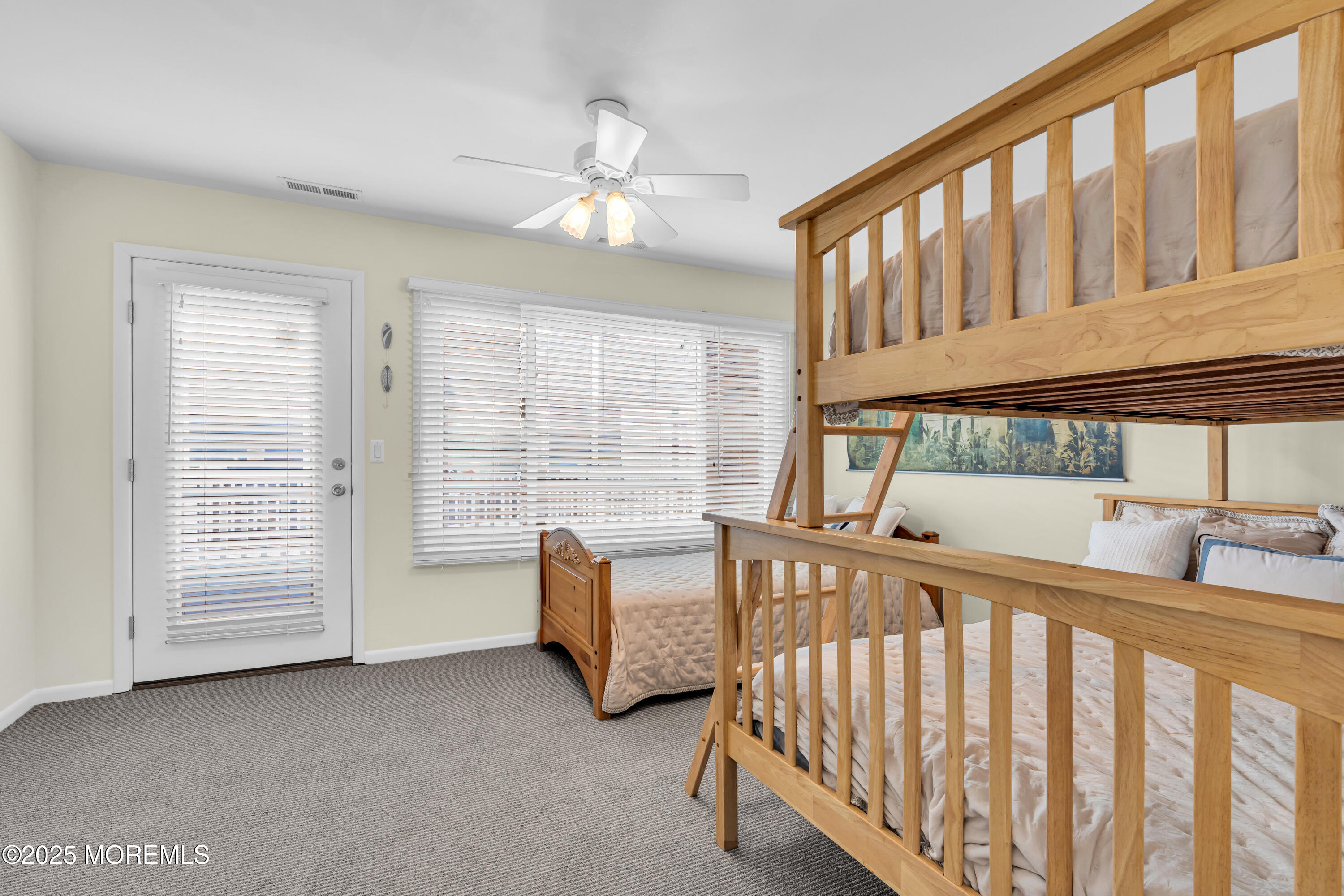 1900 Grand Central Avenue, Unit 3 Lavallette, NJ 08735 - Photo 14 of 21 a bedroom with furniture and a window