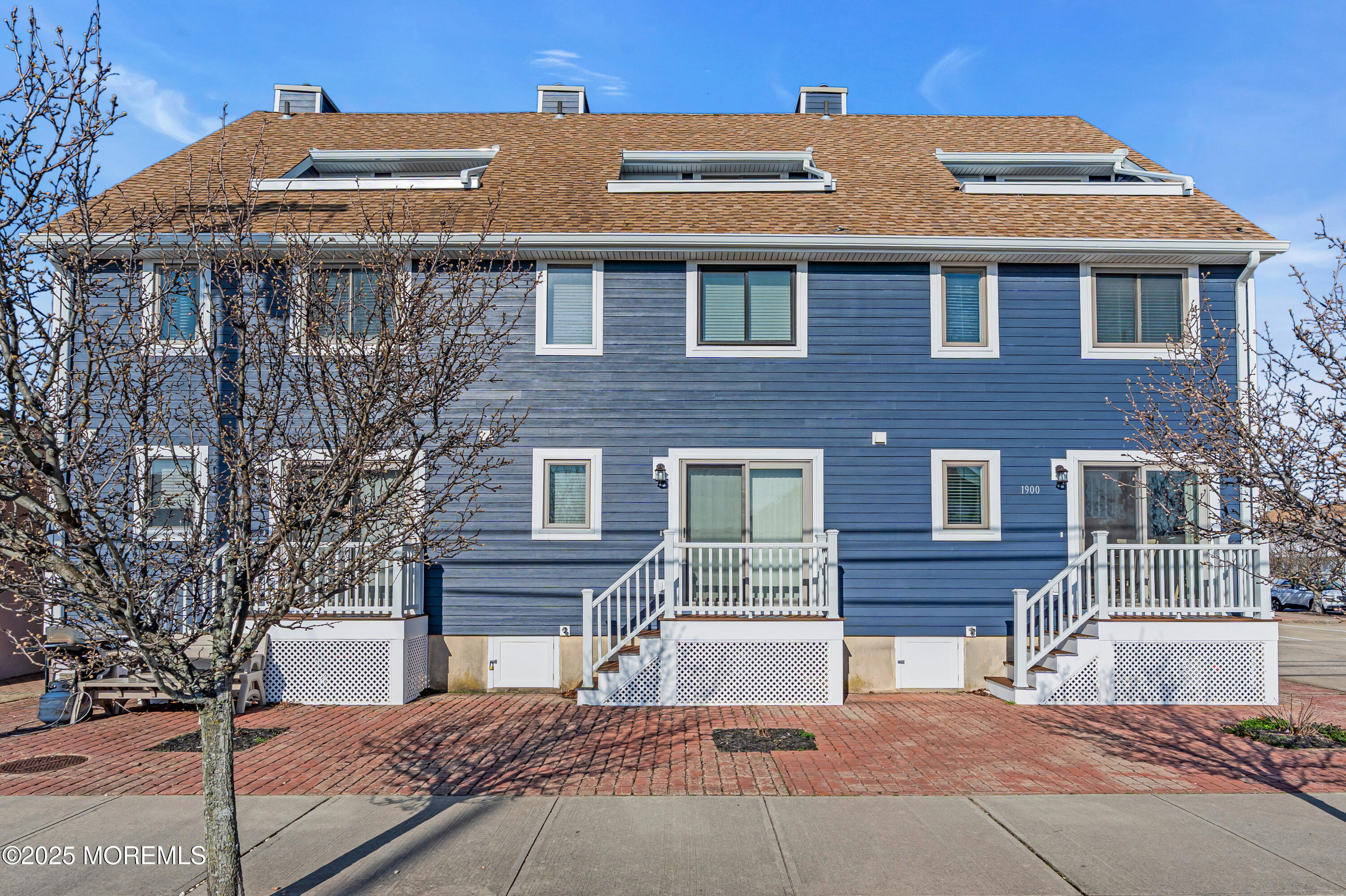 1900 Grand Central Avenue, Unit 3 Lavallette, NJ 08735 - Photo 21 of 21 a front view of a house with a yard