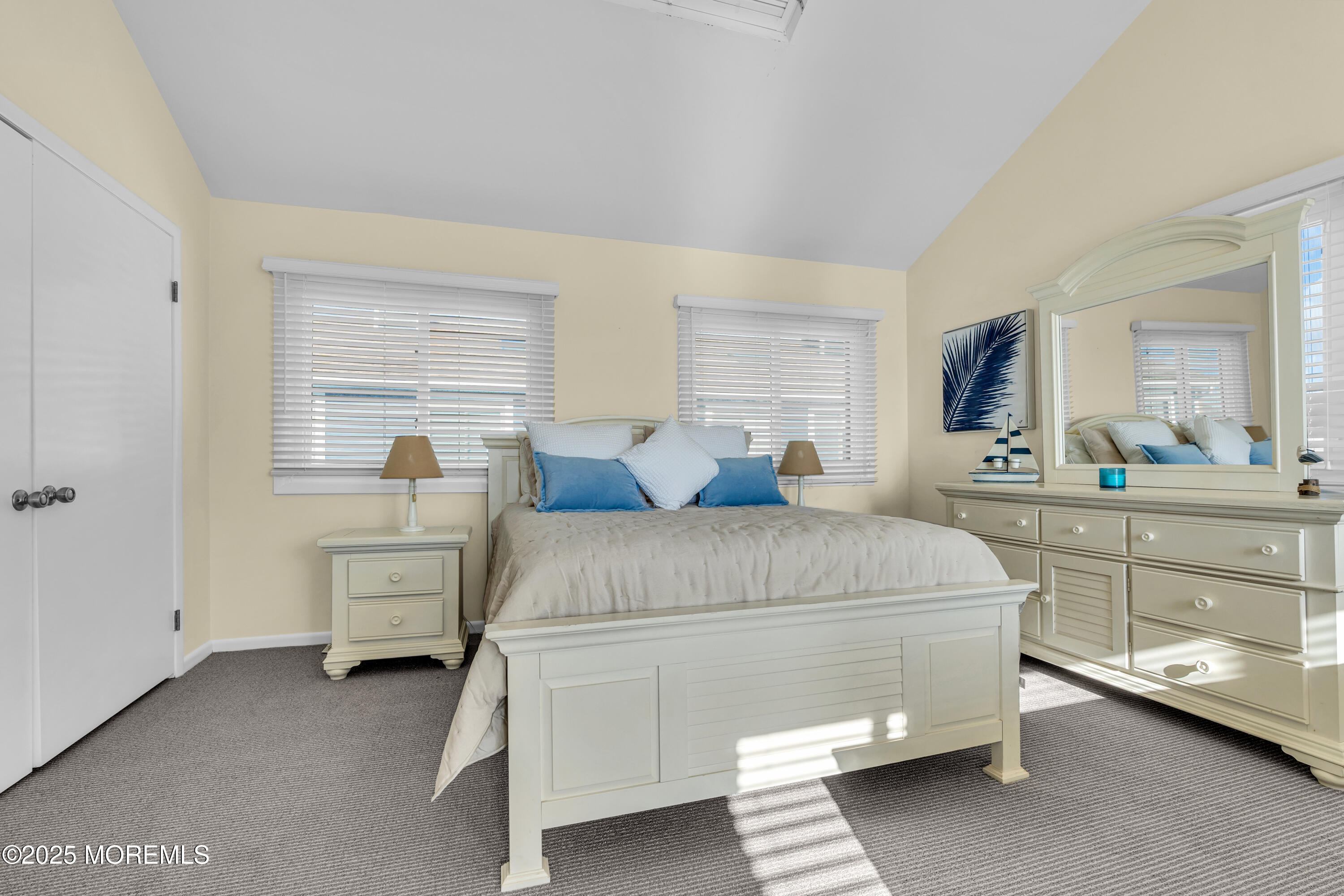 1900 Grand Central Avenue, Unit 3 Lavallette, NJ 08735 - Photo 9 of 21 a bedroom with a bed and a dresser