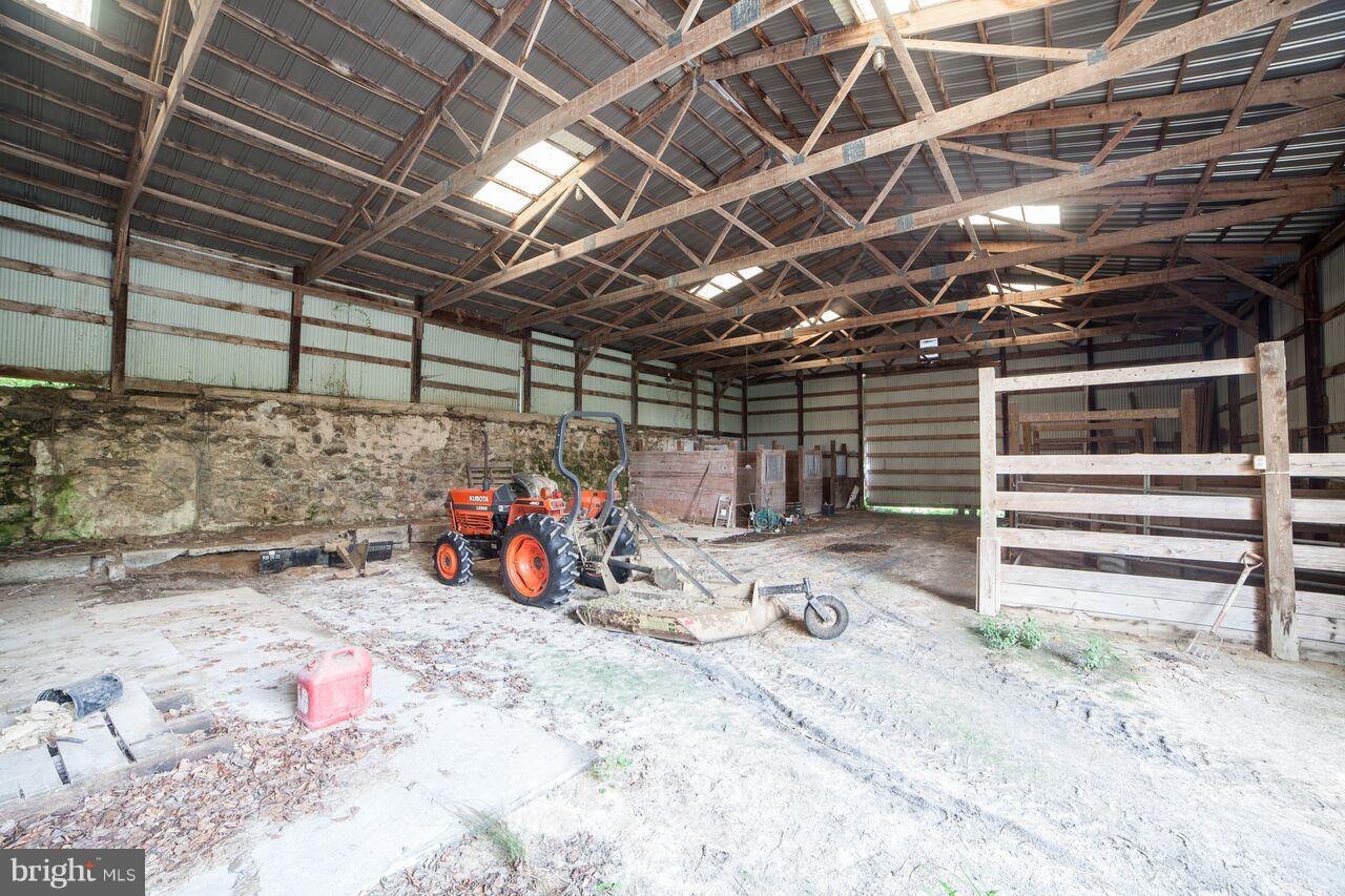 9702 McKinstry Mill Road Union Bridge, MD 21791 - Photo 13 of 20 Interior of the large barn w/ stalls