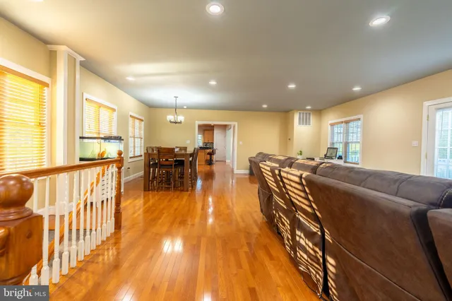 a living room with furniture and a table
