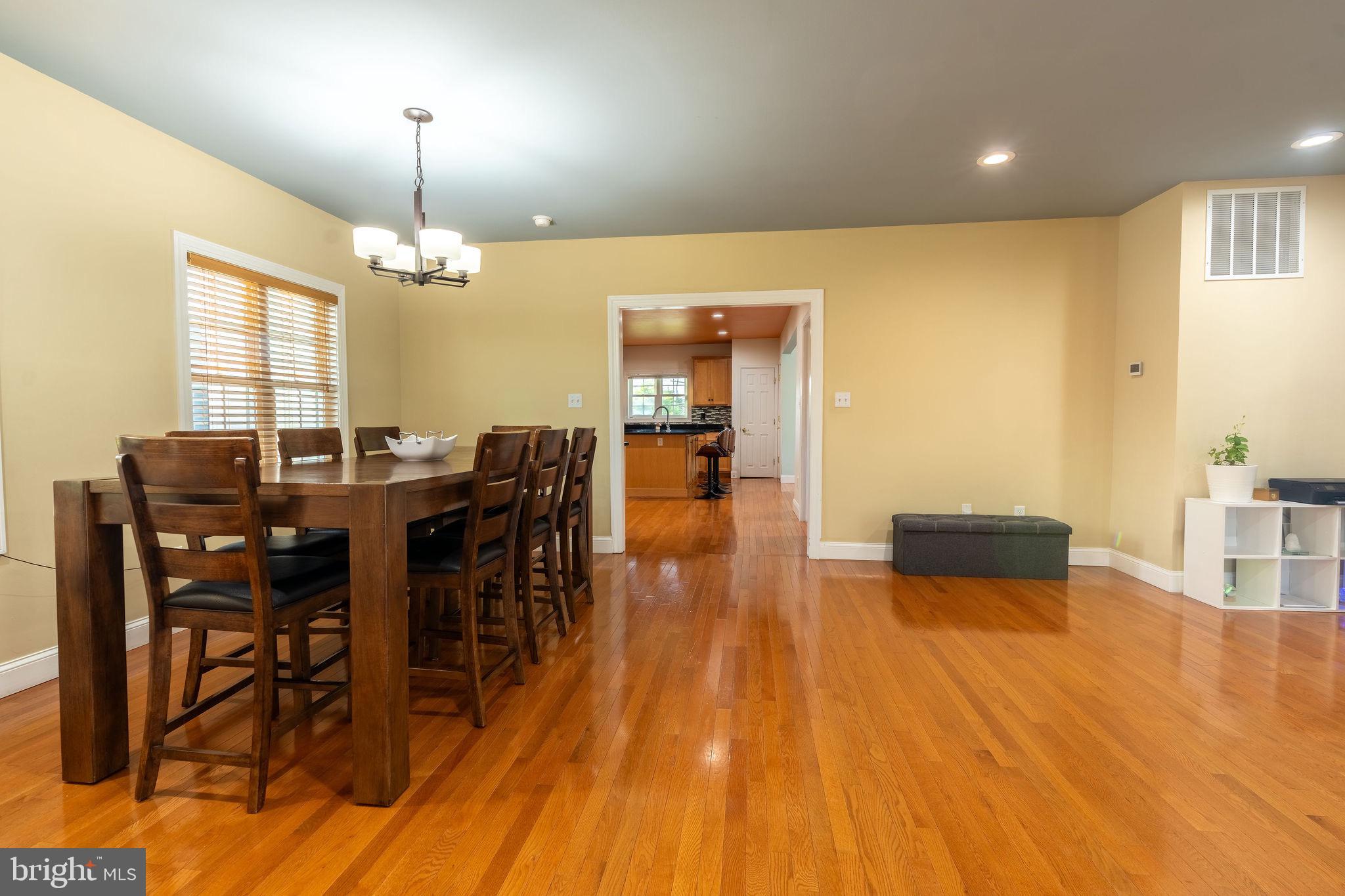 25325 Woodfield Road Damascus, MD 20872 - Photo 22 of 58 a view of a dining room with furniture