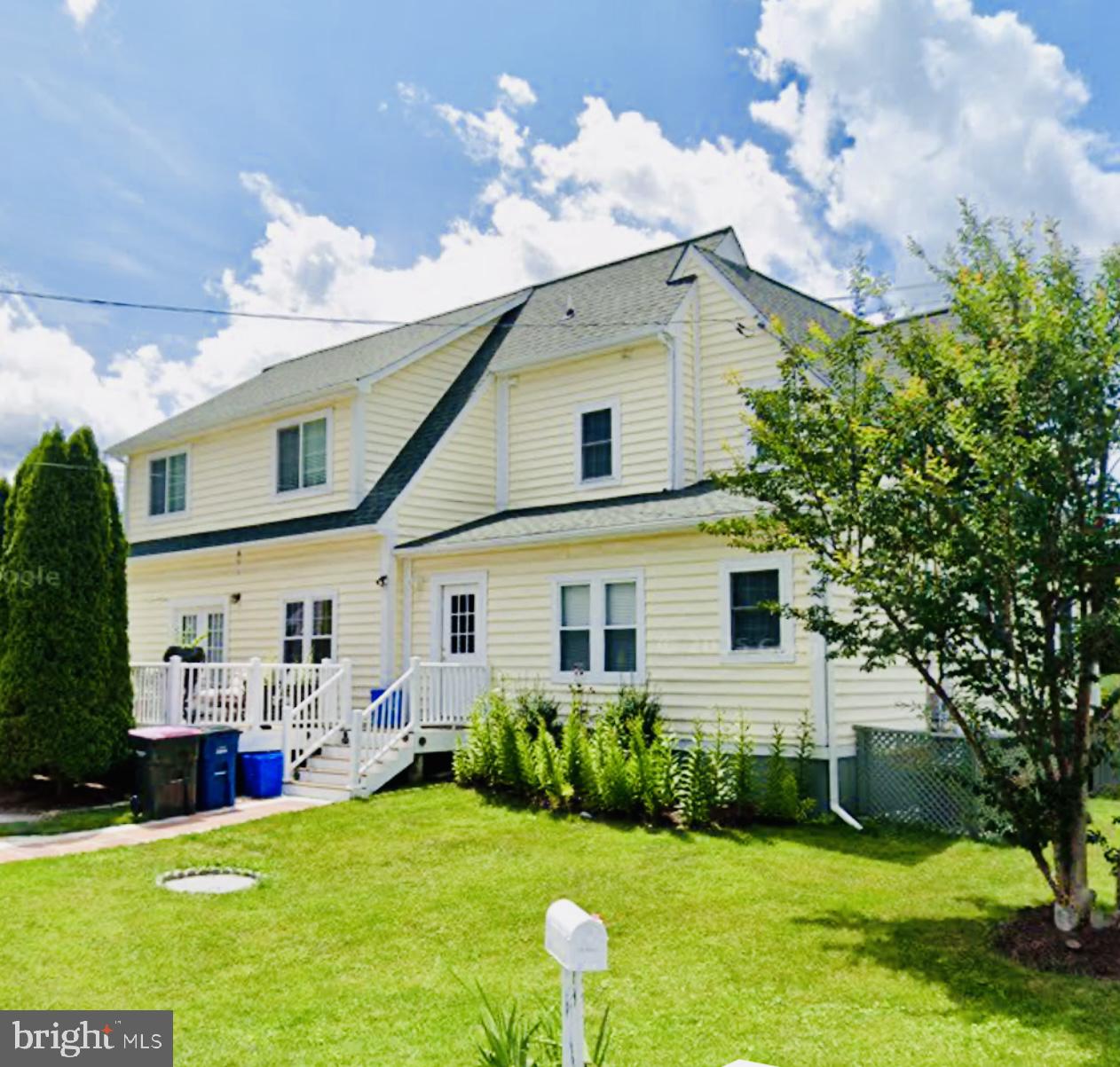 25325 Woodfield Road Damascus, MD 20872 - Photo 3 of 58 a front view of house with yard and green space