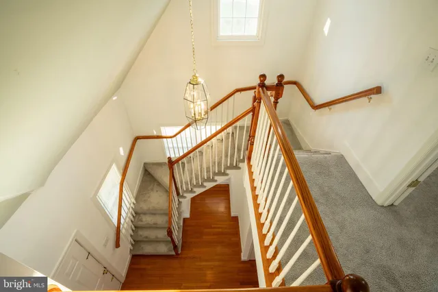 a en suite bathroom with a sink double vanity and a mirror