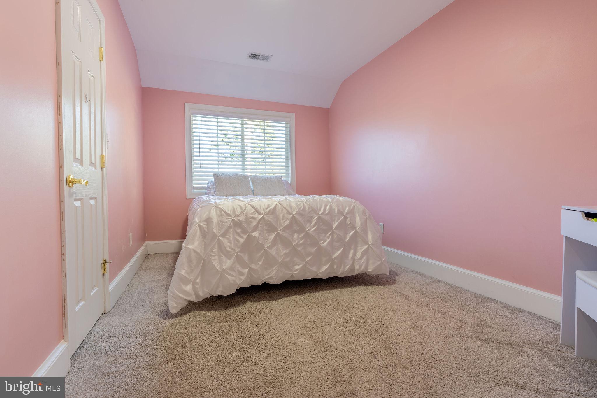 25325 Woodfield Road Damascus, MD 20872 - Photo 44 of 58 a bed room with a bed and a window