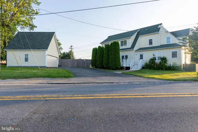 a view of a house with a swimming pool