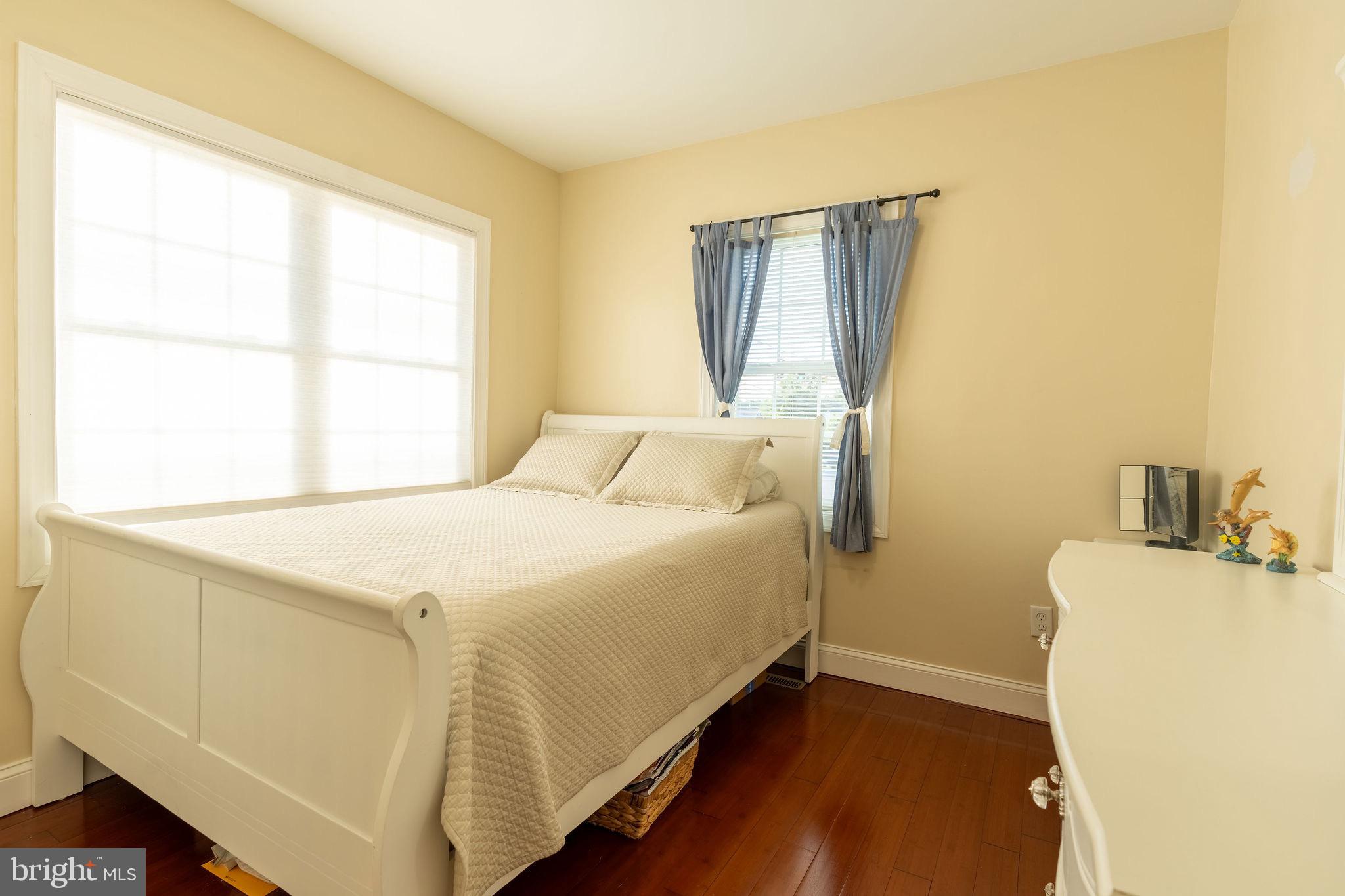 25325 Woodfield Road Damascus, MD 20872 - Photo 55 of 58 a bedroom with a bed and a window