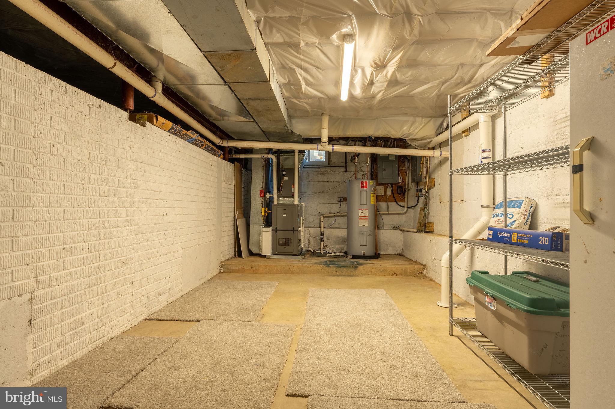 25325 Woodfield Road Damascus, MD 20872 - Photo 57 of 58 a view of empty room with wooden floor