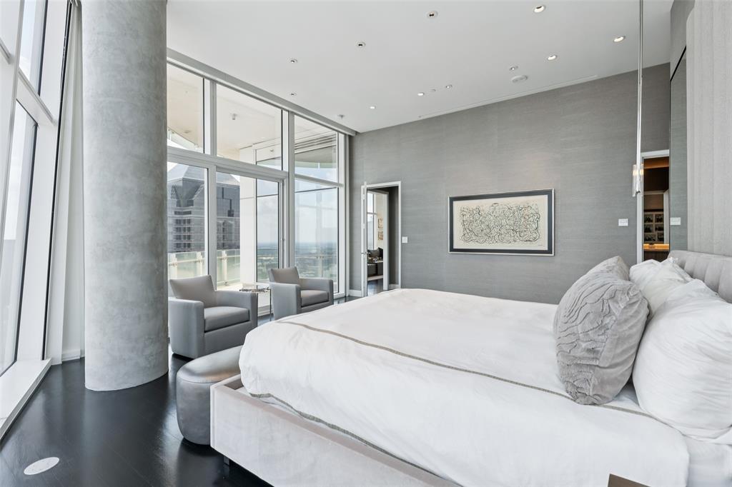 1918 Olive Street, Unit 4202 Dallas, TX 75201 - Photo 24 of 37 a bedroom with a large bed and a large window