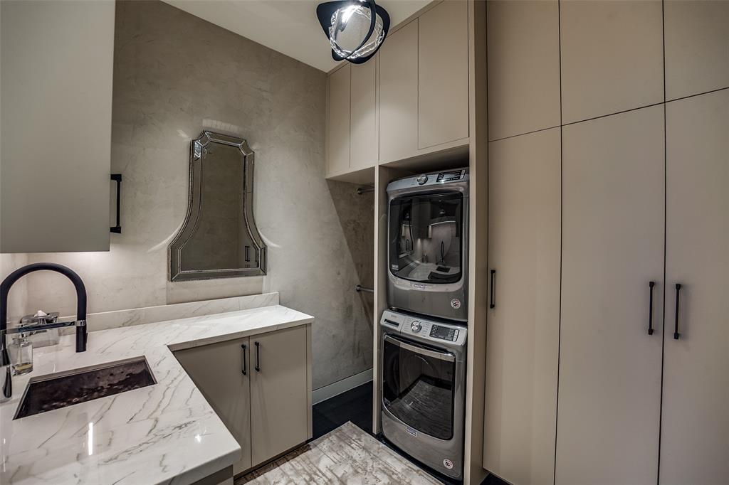 1918 Olive Street, Unit 4202 Dallas, TX 75201 - Photo 33 of 37 a close view of sink and tap