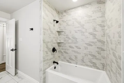a bathroom with a bathtub